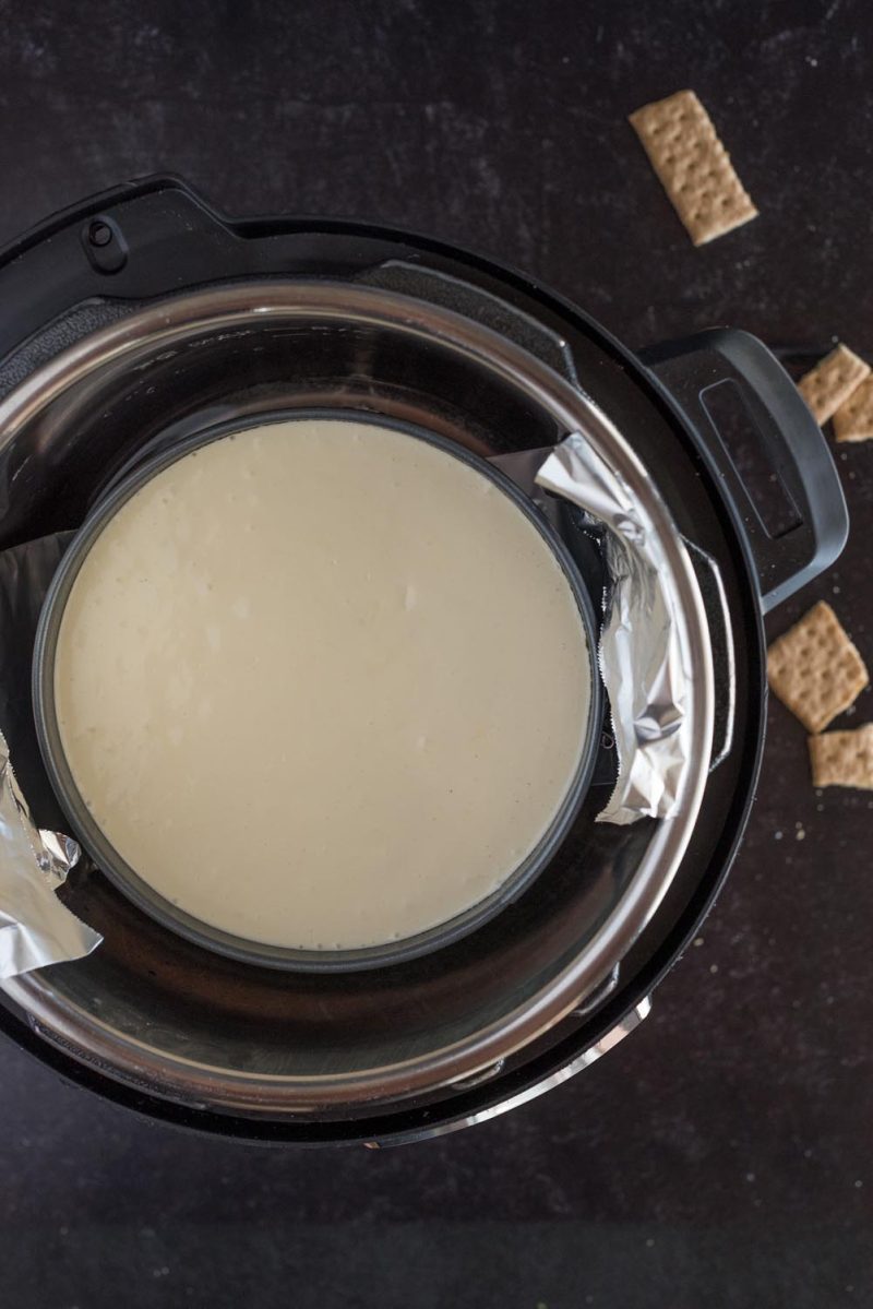 Overhead picture of an 8-inch cheesecake in a 8 quart Instant Pot.