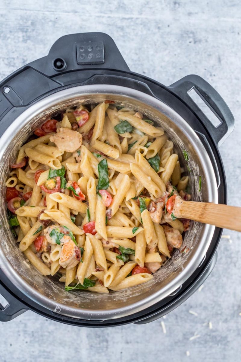 An overhead picture of chicken bacon penne cooked and ready to serve in an Instant Pot.