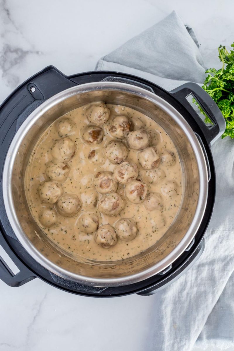 An overhead picture of Swedish Meatballs and gravy cooked inside an Instant Pot.