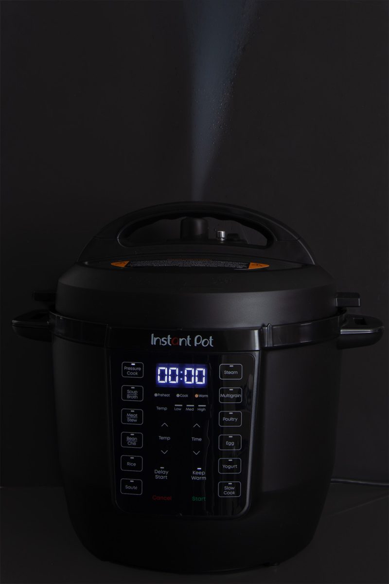A picture showing a steam release of the Instant Pot Rio.