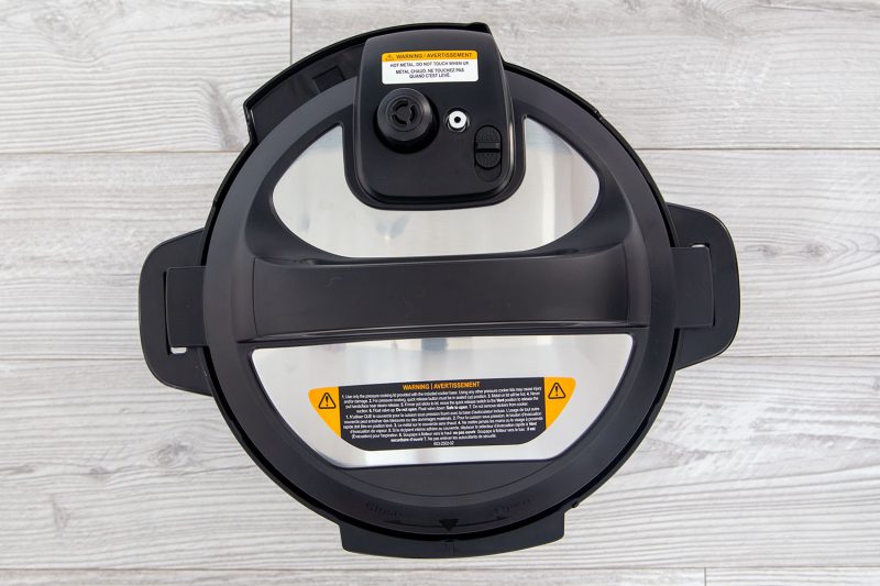 Overhead picture of an Instant Pot Rio with the lid on, showing the easy release button and fins for holding the lid on the pot.