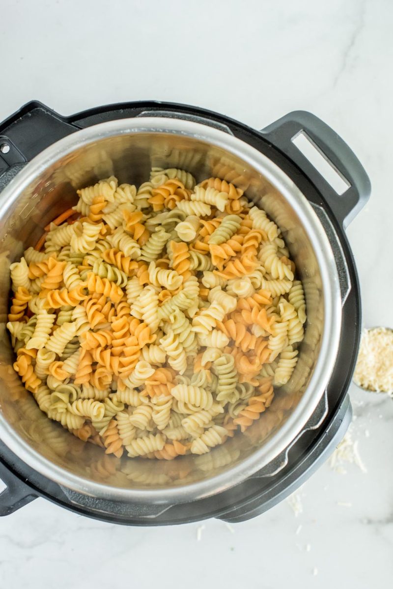 Cooked rotini noodles in an Instant Pot for making pasta salad.
