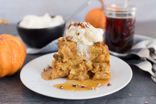 Profile image of Instant Pot / Pressure Cooker Pumpkin Spice Baked French Toast with whipped cream, maple syrup, and pecans on top.